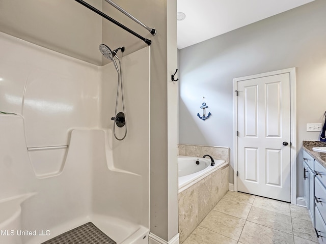 14 Le Petit Cv, Long Beach, MS 39560 - bathroom with vanity, tile patterned flooring, a bath, and a shower