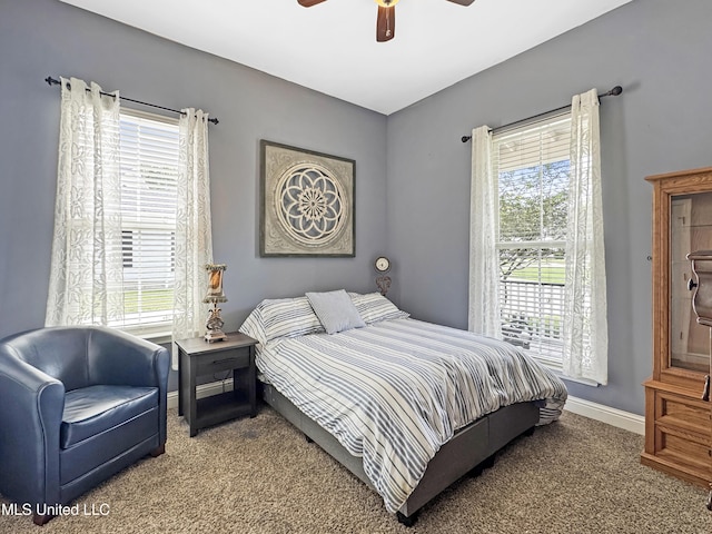 14 Le Petit Cv, Long Beach, MS 39560 - carpeted bedroom with multiple windows and a ceiling fan