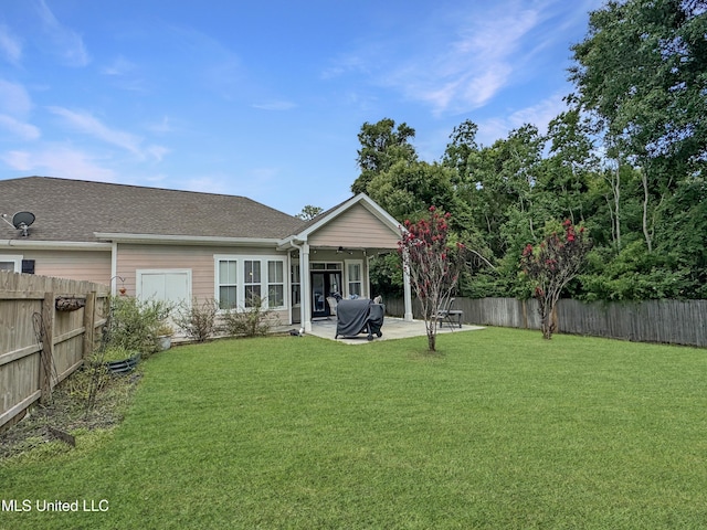 14 Le Petit Cv, Long Beach, MS 39560 - rear view of house with a ceiling fan, a fenced backyard, and a patio area