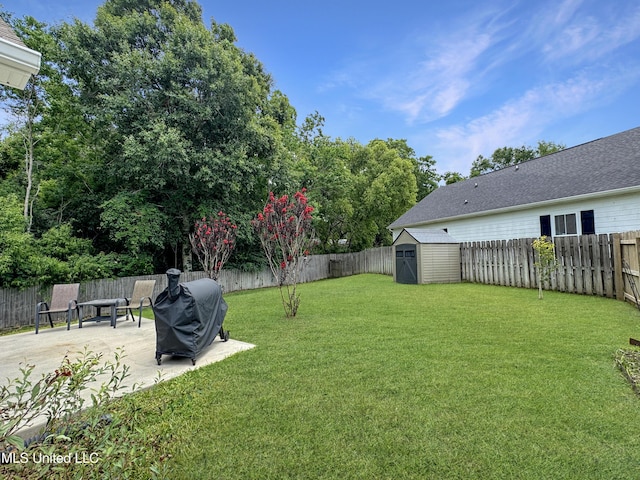 14 Le Petit Cv, Long Beach, MS 39560 - fenced backyard with a patio area and a storage shed