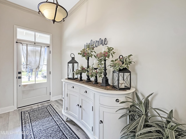 14 Le Petit Cv, Long Beach, MS 39560 - foyer featuring crown molding and light wood-style floors