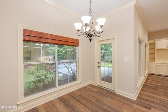 130 Covey Run, Madison, MS 39110 - unfurnished dining area featuring crown molding, a chandelier, and dark wood finished floors