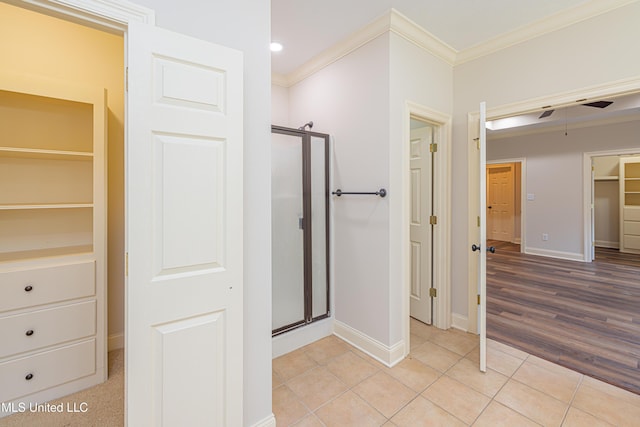 130 Covey Run, Madison, MS 39110 - bathroom featuring crown molding, a shower stall, tile patterned floors, recessed lighting, and ceiling fan
