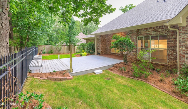 130 Covey Run, Madison, MS 39110 - fenced backyard featuring a wooden deck