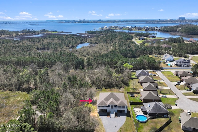 drone / aerial view featuring a water view