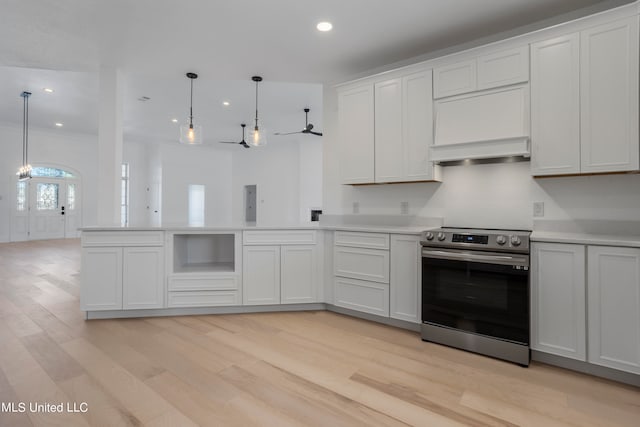 kitchen with white cabinets and stainless steel electric range oven