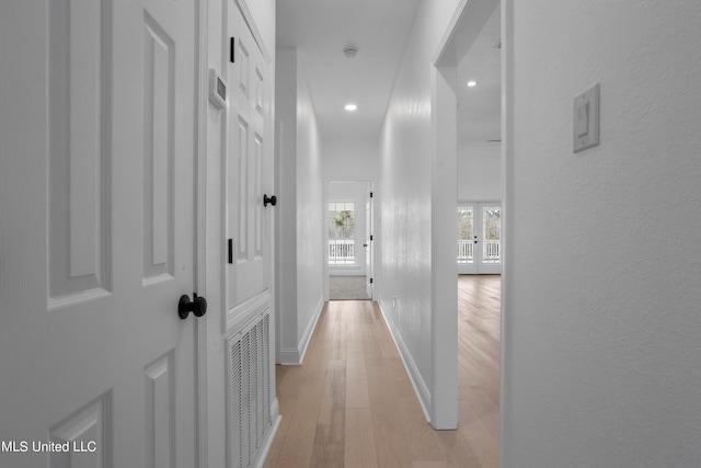 hall featuring light hardwood / wood-style floors