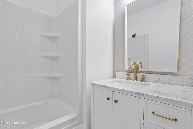 bathroom with vanity and tub / shower combination