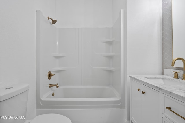 full bathroom featuring vanity, shower / bathing tub combination, and toilet