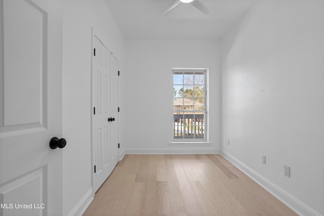 unfurnished room with light hardwood / wood-style floors and ceiling fan