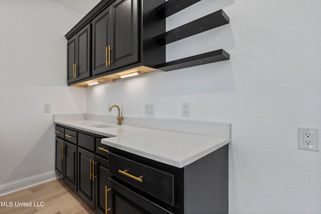 kitchen featuring light hardwood / wood-style flooring and sink