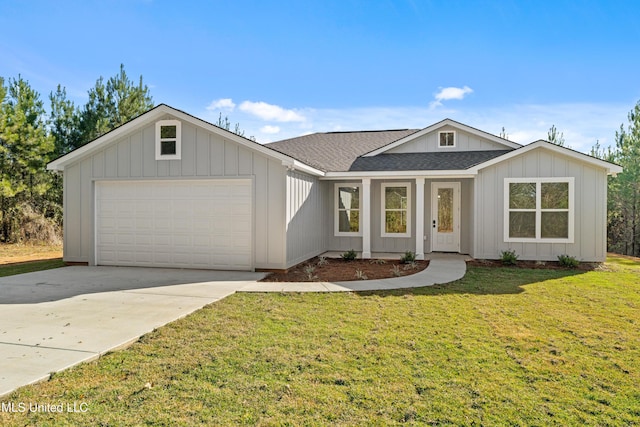 ranch-style home featuring a garage and a front lawn