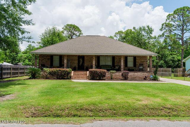 6816 Natchez St, Biloxi, MS 39532 - view of front of home with a porch