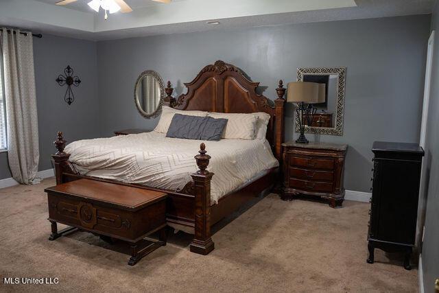 6816 Natchez St, Biloxi, MS 39532 - carpeted bedroom featuring baseboards and ceiling fan