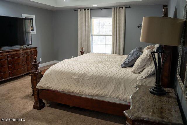 6816 Natchez St, Biloxi, MS 39532 - carpeted bedroom with baseboards and recessed lighting