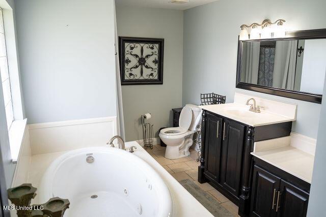 6816 Natchez St, Biloxi, MS 39532 - bathroom featuring vanity and a whirlpool tub