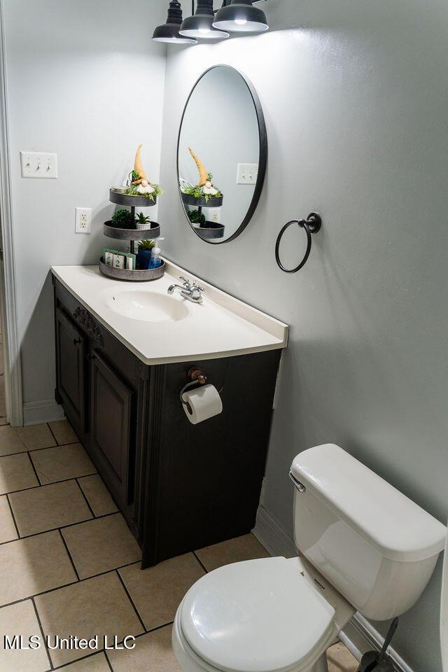 6816 Natchez St, Biloxi, MS 39532 - bathroom featuring vanity and tile patterned flooring