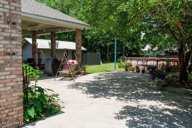 6816 Natchez St, Biloxi, MS 39532 - view of patio / terrace featuring heating fuel