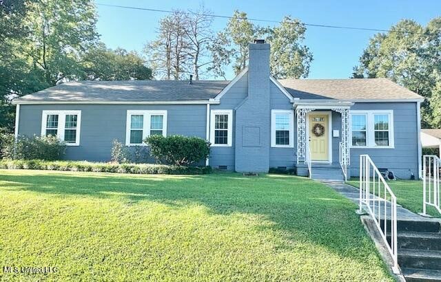 ranch-style house with a front yard, crawl space, and a chimney