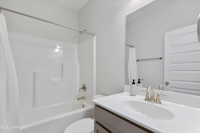 full bathroom featuring vanity, toilet, and shower / tub combo with curtain