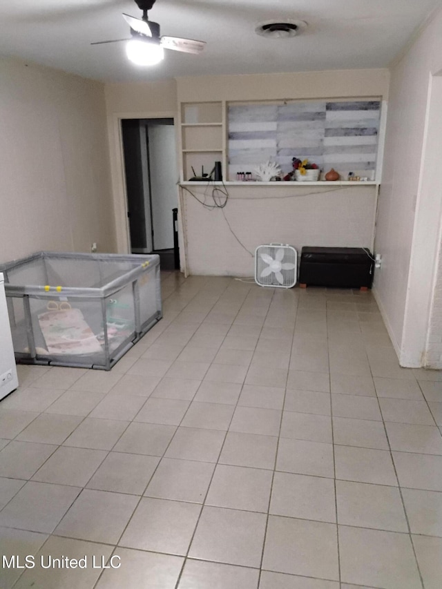 807 Line Dr, Forest, MS 39074 - kitchen featuring light tile patterned floors, ceiling fan, and open shelves
