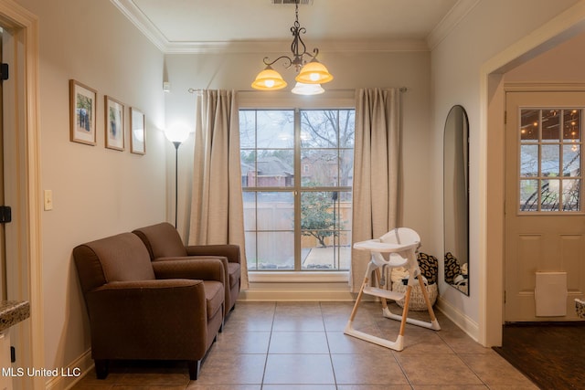 living area with crown molding, tile patterned floors, and an inviting chandelier