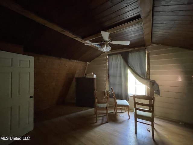 bonus room featuring wood ceiling, wooden walls, wood-type flooring, and vaulted ceiling