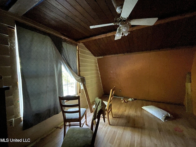 interior space featuring hardwood / wood-style flooring, vaulted ceiling, and wood ceiling