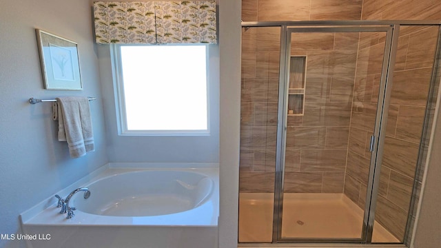 bathroom with independent shower and bath