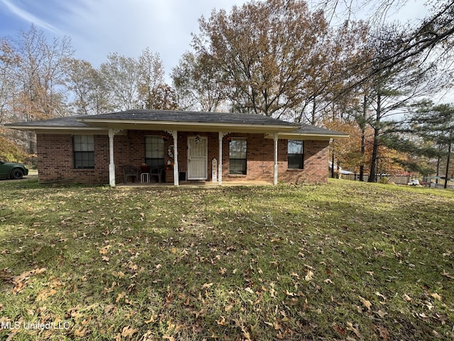 ranch-style home with a patio area and a front lawn