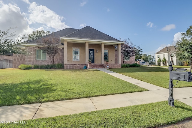 view of front of house with a porch and a front yard