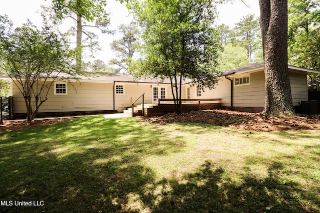 view of yard featuring a wooden deck