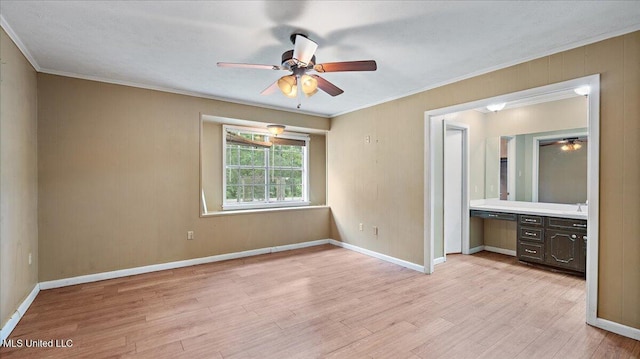 3222 Stage Rd, Morton, MS 39117 - unfurnished bedroom featuring light wood-type flooring, ornamental molding, ensuite bath, and ceiling fan