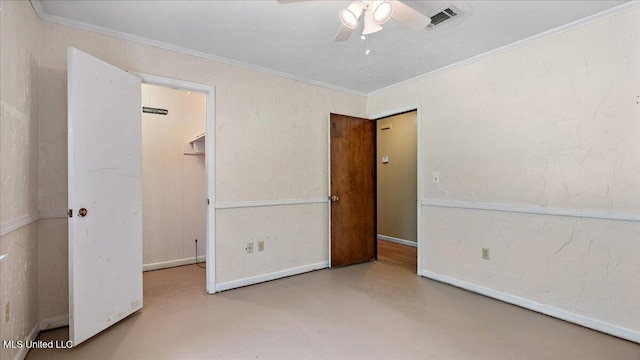 3222 Stage Rd, Morton, MS 39117 - unfurnished bedroom featuring finished concrete floors, ornamental molding, a ceiling fan, a closet, and a spacious closet