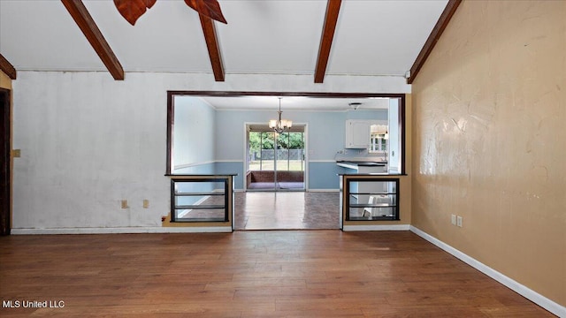 3222 Stage Rd, Morton, MS 39117 - unfurnished living room with a chandelier, wood finished floors, and ornamental molding