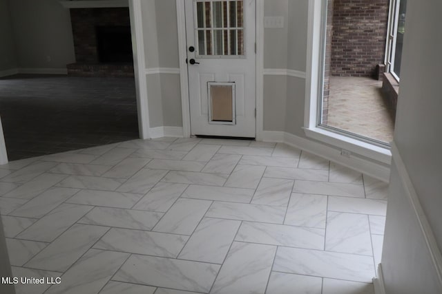 spare room featuring baseboards
