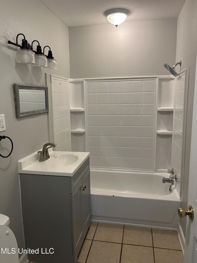 full bathroom with tile patterned flooring, vanity, and shower / bathtub combination