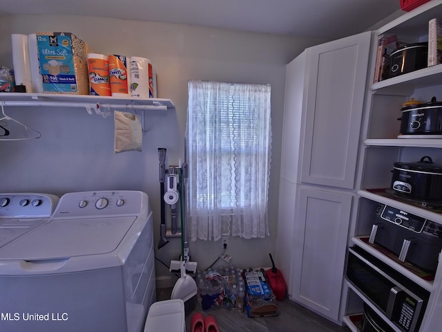 laundry area featuring cabinet space and washer and dryer