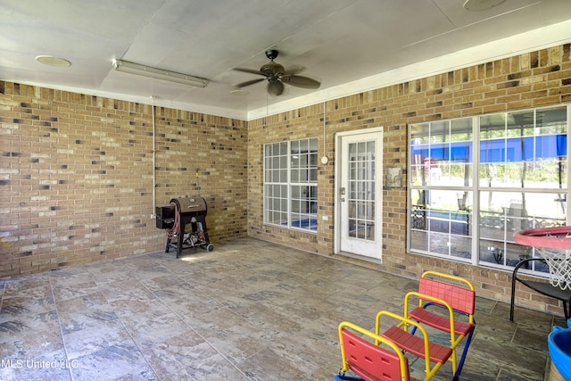 view of patio / terrace featuring grilling area and ceiling fan