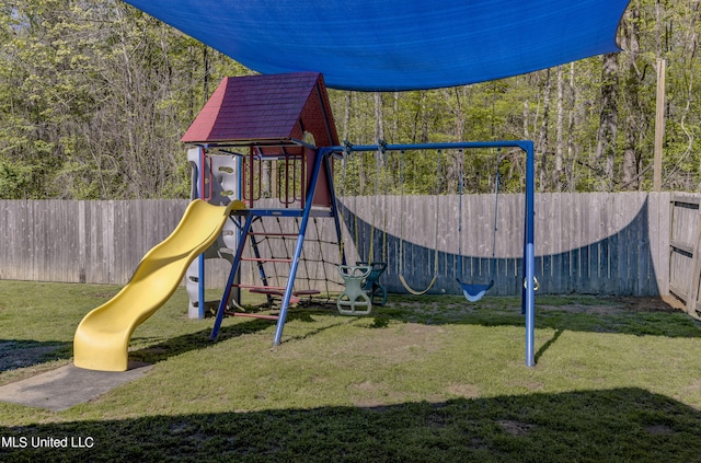 view of jungle gym with a yard