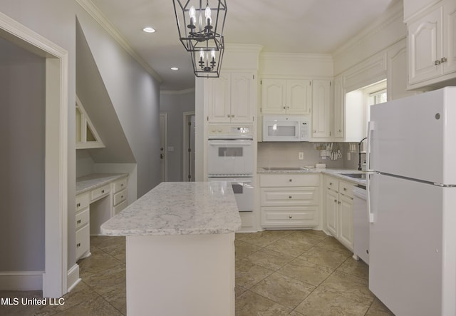 kitchen with a kitchen island, backsplash, decorative light fixtures, white cabinetry, and white appliances