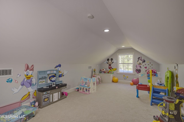 game room featuring carpet and vaulted ceiling