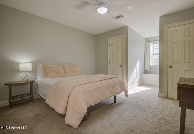 carpeted bedroom featuring ceiling fan