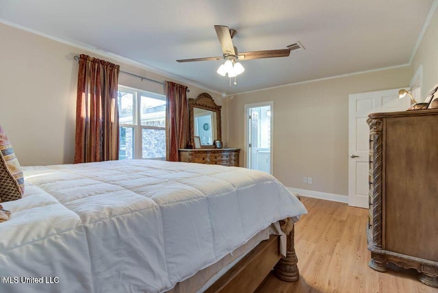 bedroom featuring crown molding, light wood finished floors, visible vents, ceiling fan, and baseboards