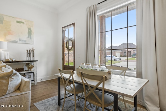 254 Buttonwood Ln, Canton, MS 39046 - dining area with plenty of natural light, wood finished floors, and ornamental molding