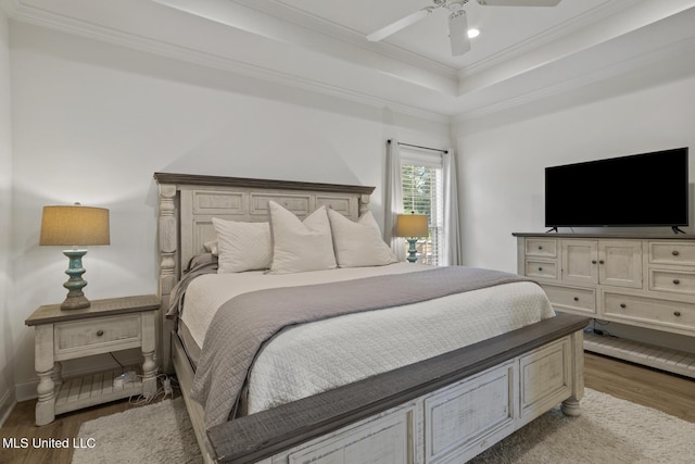 254 Buttonwood Ln, Canton, MS 39046 - bedroom with wood finished floors, ornamental molding, ceiling fan, a tray ceiling, and recessed lighting