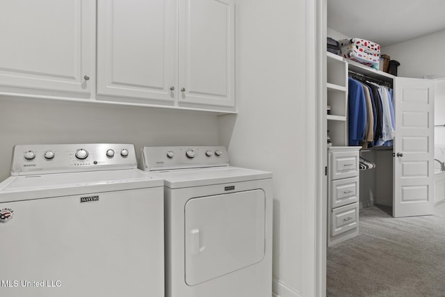 254 Buttonwood Ln, Canton, MS 39046 - laundry room featuring cabinet space, separate washer and dryer, and light carpet