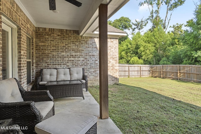 254 Buttonwood Ln, Canton, MS 39046 - fenced backyard with a ceiling fan, outdoor lounge area, and a patio area