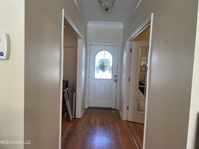 doorway to outside featuring crown molding and wood finished floors