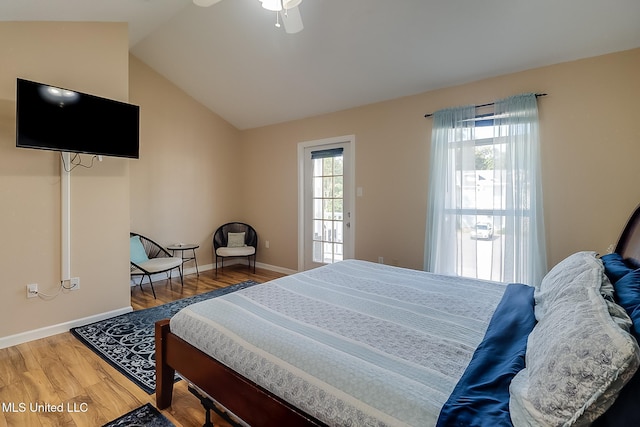 bedroom with lofted ceiling, wood-type flooring, and ceiling fan